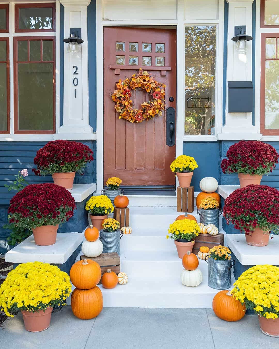 Tiered Fall Decorations on the Steps