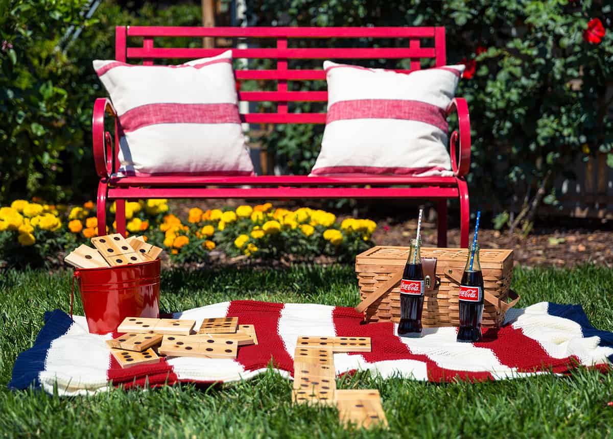 Red Bench with Pillows