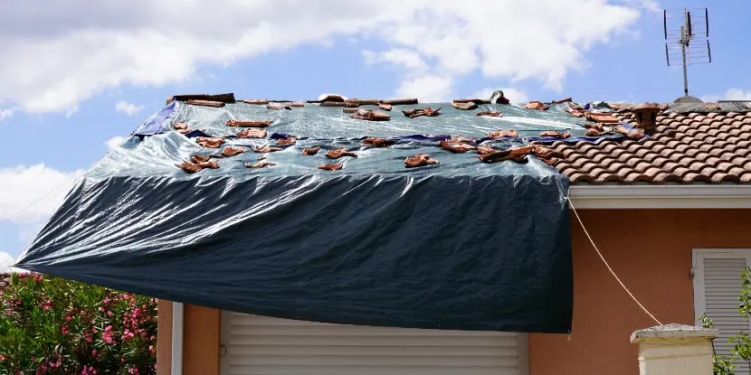 A tarp covering a roof