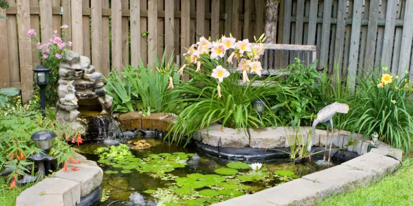 A small formal pond with a waterfall