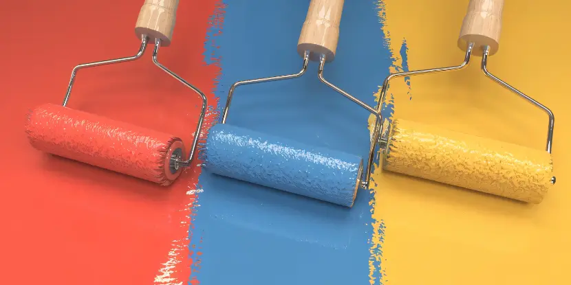 Rollers with red, blue & yellow paint