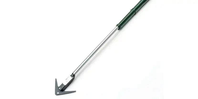 A long-handled weed puller