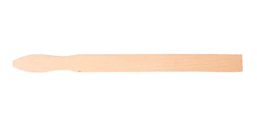 A wooden paint stirrer