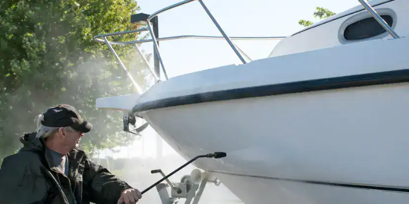 Pressure washing a boat for storage