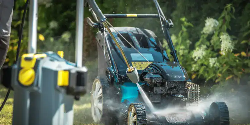 Power washing a lawnmower