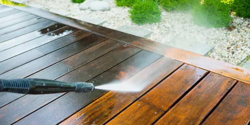 A power washer blasts away years of grime