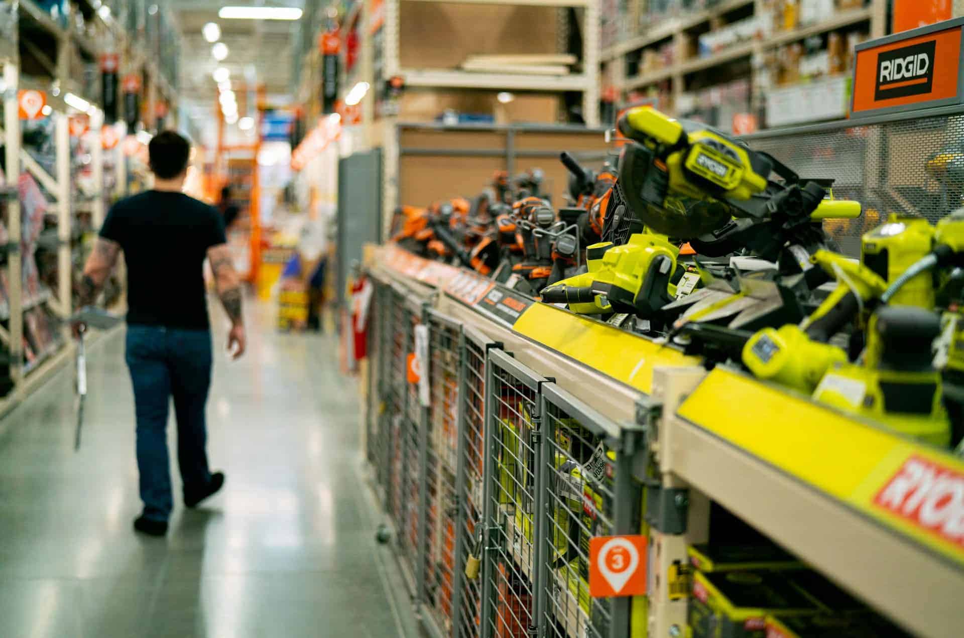 aisle-of-a-hardware-store Customer browsing tools inside a hardware store near me location.